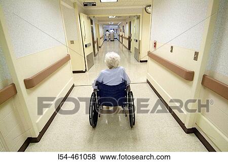 Senior female undergoes rehabilitation in a nursing home facility after falling and breaking her femur View Large Photo Image Stock Photo - Senior female undergoes rehabilitation in a nursing home facility after falling and breaking her femur. Fotosearch