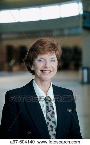Senior flight attendant View Large Photo Image Stock Image - Senior flight attendant. Fotosearch