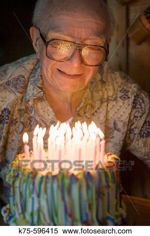 Senior, male, caucasian, age 87, candles, birthday cake, celebration, happy View Large Photo Image Stock Photography - Senior, male, caucasian, age 87, candles, birthday cake, celebration, happy. Fotosearch