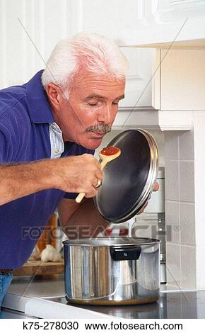 Senior male tasting the sauce View Large Photo Image Stock Image - Senior male tasting the sauce. Fotosearch