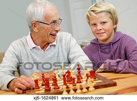Senior man and grandson View Large Photo Image Stock Image - Senior man and grandson. Fotosearch
