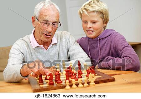 Senior man and grandson View Large Photo Image Stock Image - Senior man and grandson. Fotosearch