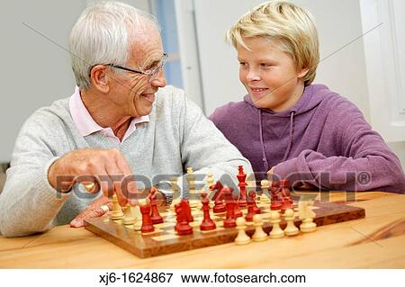 Senior man and grandson View Large Photo Image Stock Photo - Senior man and grandson. Fotosearch