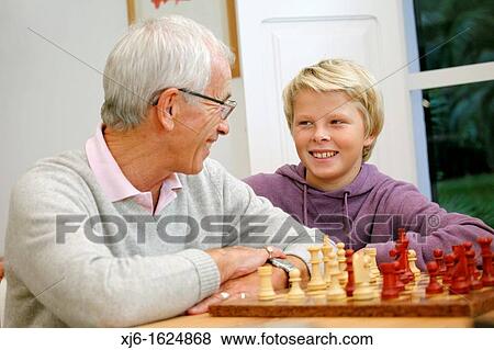 Senior man and grandson View Large Photo Image Stock Photo - Senior man and grandson. Fotosearch