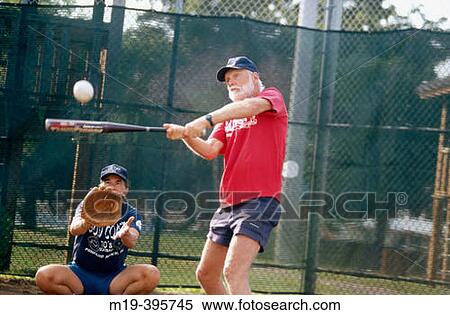 senior man hitting a softball View Large Photo Image Stock Photography - senior man hitting a softball. Fotosearch