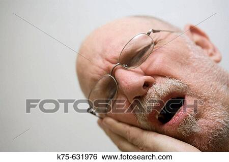 Senior man in pain View Large Photo Image Stock Photograph - Senior man in pain. Fotosearch