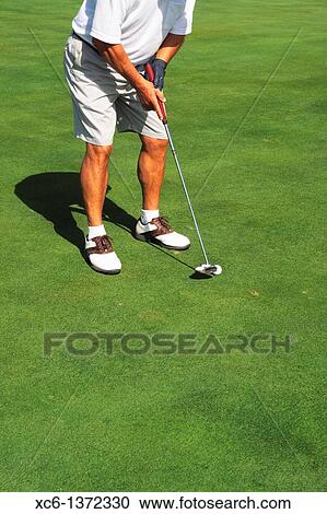 Senior man playing golf, South Tenerife, Canary Islands, Spain View Large Photo Image Stock Image - Senior man playing golf, South Tenerife, Canary Islands, Spain. Fotosearch