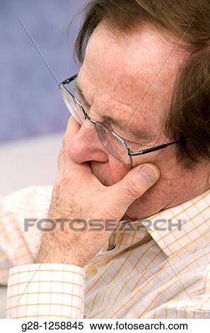 senior man resting and having a nap with his eyeglasses View Large Photo Image Stock Photography - senior man resting and having a nap with his eyeglasses. Fotosearch