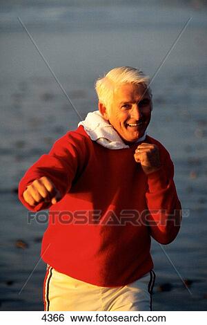 Senior man shadow-boxing View Large Photo Image Stock Photograph - Senior man shadow-boxing. Fotosearch