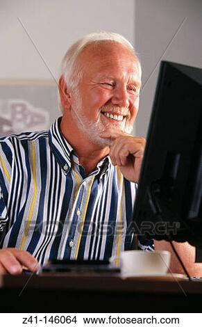 Senior man with computer View Large Photo Image Picture - Senior man with computer. Fotosearch