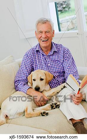 Picture - Senior man with dog. Fotosearch