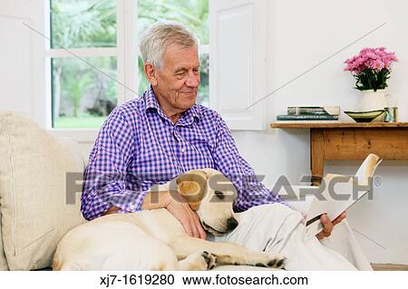 Senior man with dog View Large Photo Image Stock Image - Senior man with dog. Fotosearch