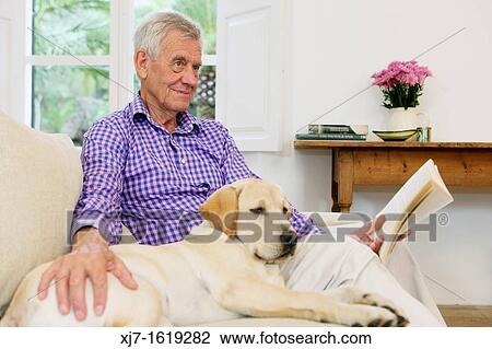 Senior man with dog View Large Photo Image Stock Image - Senior man with dog. Fotosearch