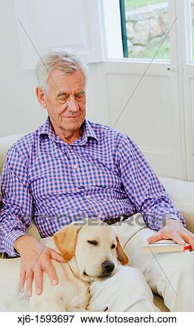 Senior man with dog View Large Photo Image Stock Photo - Senior man with dog. Fotosearch