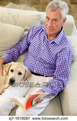 Senior man with dog View Large Photo Image Stock Photo - Senior man with dog. Fotosearch