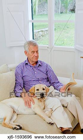 Senior man with dog View Large Photo Image Stock Photograph - Senior man with dog. Fotosearch