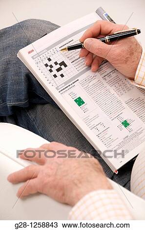 senior man's hands with pen doing a crosswords to exercise memory and fight Alzheimer disease View Large Photo Image Stock Image - senior man's hands with pen doing a crosswords to exercise memory and fight Alzheimer disease. Fotosearch
