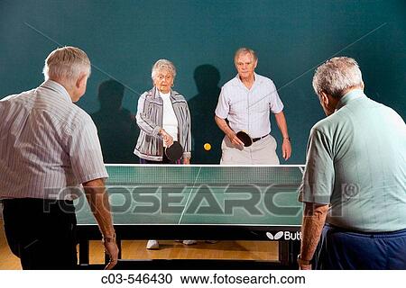 Senior men and women ranging in age from their 70's to their 90's play ping pong at a seniors? athletic facility in the retirement community of Laguna Woods, CA. View Large Photo Image Stock Image - Senior men and women ranging in age from their 70's to their 90's play ping pong at a seniors? athletic facility in the retirement community of Laguna Woods, CA.. Fotosearch