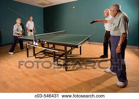 Senior men and women ranging in age from their 70's to their 90's play ping pong at a seniors? athletic facility in the retirement community of Laguna Woods, CA. View Large Photo Image Stock Image - Senior men and women ranging in age from their 70's to their 90's play ping pong at a seniors? athletic facility in the retirement community of Laguna Woods, CA.. Fotosearch