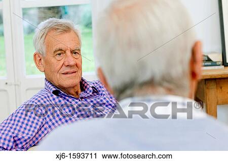 Senior men, chatting View Large Photo Image Stock Image - Senior men, chatting. Fotosearch