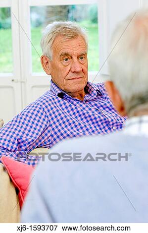 Senior men, chatting View Large Photo Image Stock Photo - Senior men, chatting. Fotosearch