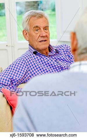 Senior men, chatting View Large Photo Image Stock Photo - Senior men, chatting. Fotosearch