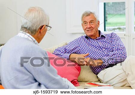 Senior men, chatting View Large Photo Image Stock Photo - Senior men, chatting. Fotosearch