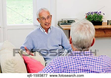 Senior men, chatting View Large Photo Image Stock Photo - Senior men, chatting. Fotosearch