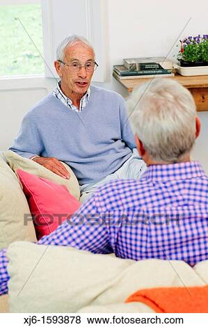 Senior men, chatting View Large Photo Image Stock Photo - Senior men, chatting. Fotosearch