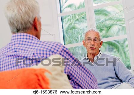 Senior men, chatting View Large Photo Image Stock Photograph - Senior men, chatting. Fotosearch