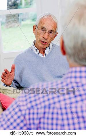 Stock Photography - Senior men, chatting. Fotosearch