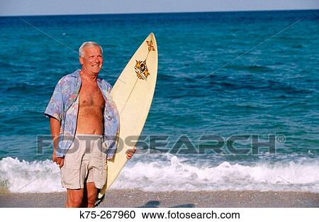 Stock Image - senior surfer. Fotosearch