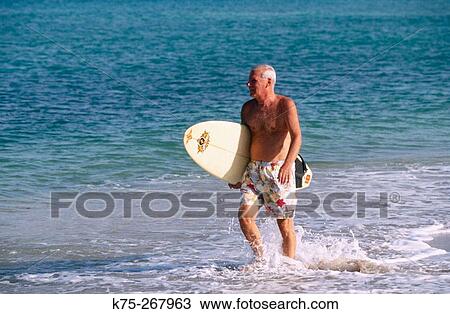 Senior surfer View Large Photo Image Stock Image - Senior surfer. Fotosearch
