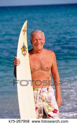 Senior surfer View Large Photo Image Stock Photo - Senior surfer. Fotosearch