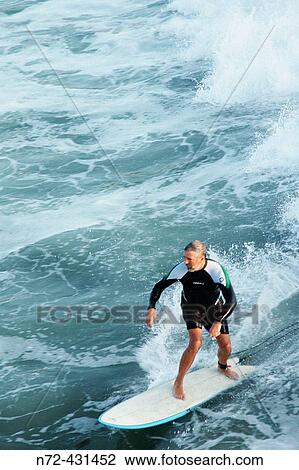 Senior surfing. Baja California. Mexico. View Large Photo Image Stock Image - Senior surfing. Baja California. Mexico.. Fotosearch