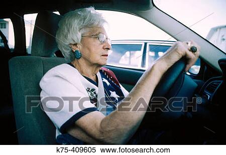 Senior woman behind the wheel View Large Photo Image Stock Photography - Senior woman behind the wheel. Fotosearch