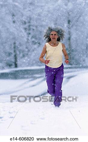 Senior woman jogging, Alaska View Large Photo Image Stock Image - Senior woman jogging, Alaska. Fotosearch