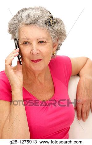 senior woman on the phone smiling View Large Photo Image Stock Image - senior woman on the phone smiling. Fotosearch