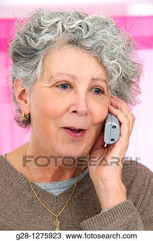 senior woman on the phone smiling View Large Photo Image Stock Image - senior woman on the phone smiling. Fotosearch