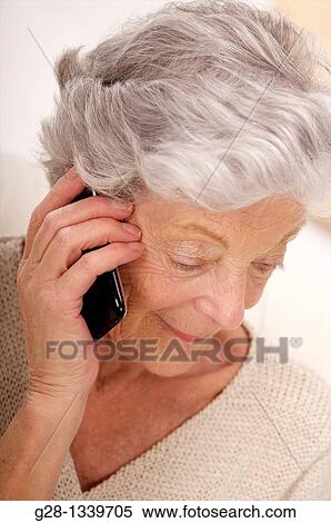 senior woman phoning with an i phone View Large Photo Image Stock Photography - senior woman phoning with an i phone. Fotosearch