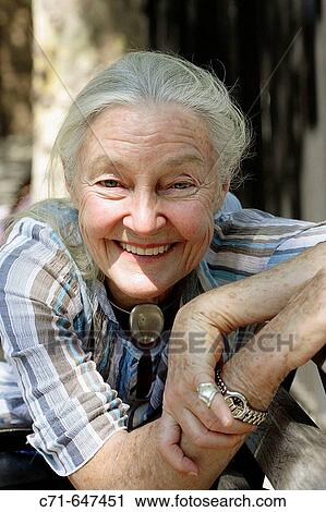 Senior woman smiling in the camera View Large Photo Image Stock Image - Senior woman smiling in the camera. Fotosearch