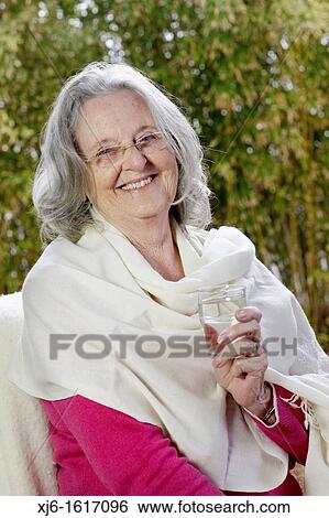 Senior woman View Large Photo Image Stock Photograph - Senior woman. Fotosearch