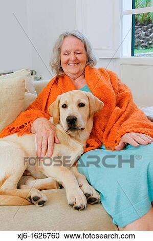 Senior woman with dog View Large Photo Image Stock Image - Senior woman with dog. Fotosearch