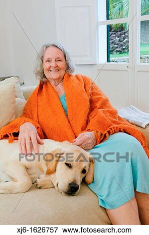 Senior woman with dog View Large Photo Image Stock Photo - Senior woman with dog. Fotosearch