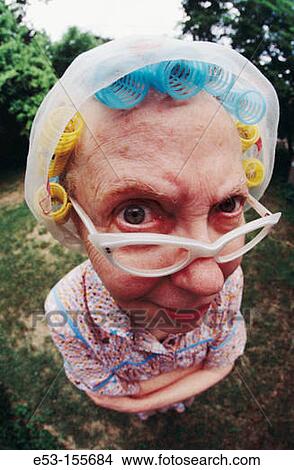 Senior woman with eyeglasses and hair in curlers View Large Photo Image Picture - Senior woman with eyeglasses and hair in curlers. Fotosearch
