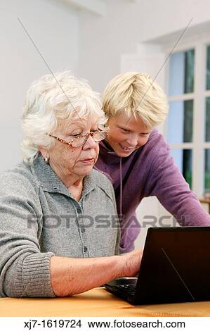 Picture - Senior woman with grandson. Fotosearch