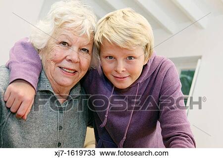 Stock Image - Senior woman with grandson. Fotosearch
