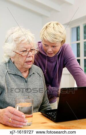 Senior woman with grandson View Large Photo Image Stock Photo - Senior woman with grandson. Fotosearch