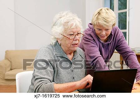 Senior woman with grandson View Large Photo Image Stock Photography - Senior woman with grandson. Fotosearch