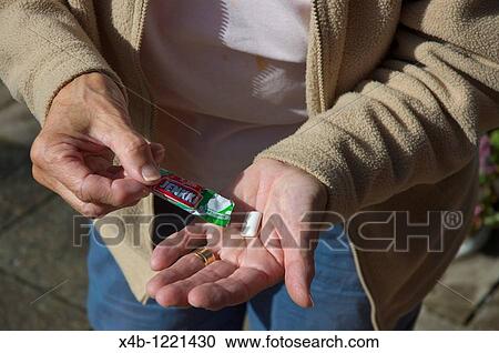 Senior woman with Jenkki Finnish chewing gum with Xylitol sweetener Finland Scandinavia northern Europe View Large Photo Image Stock Image - Senior woman with Jenkki Finnish chewing gum with Xylitol sweetener Finland Scandinavia northern Europe. Fotosearch